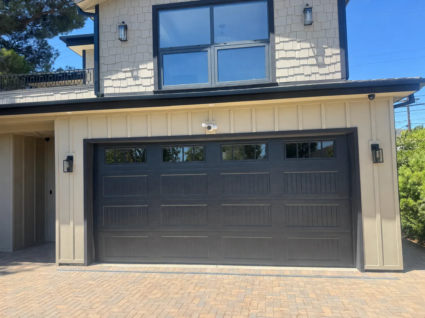 Modern black garage door installed by TruePro on a Southern California home